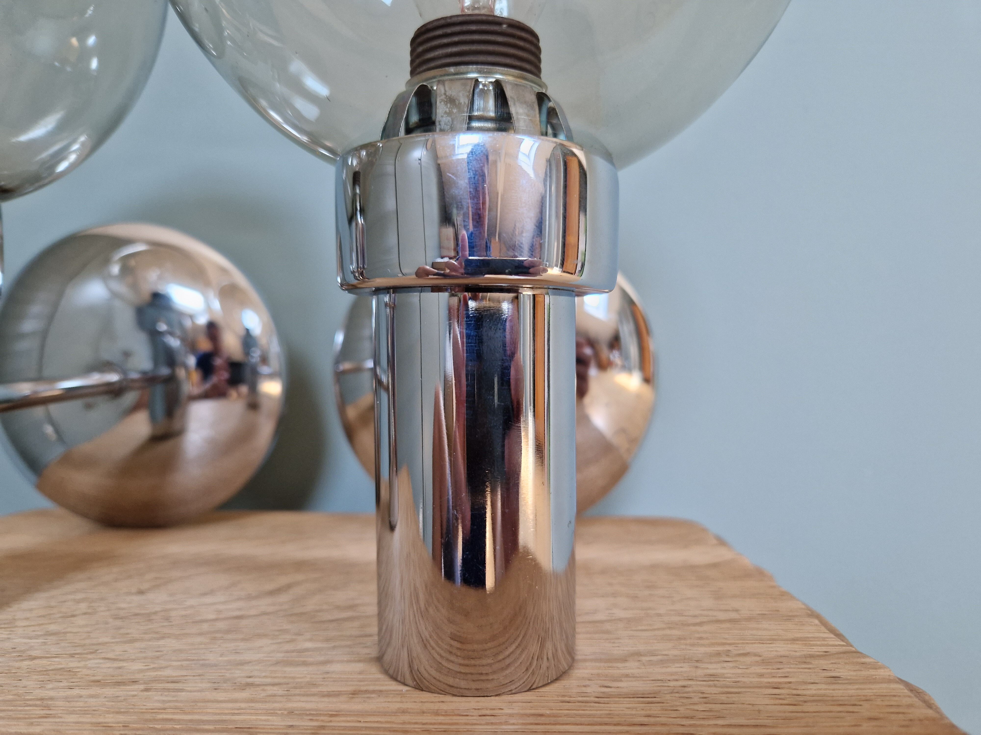 Pair of vintage wall lights in chromed metal and smoked glass, 70s