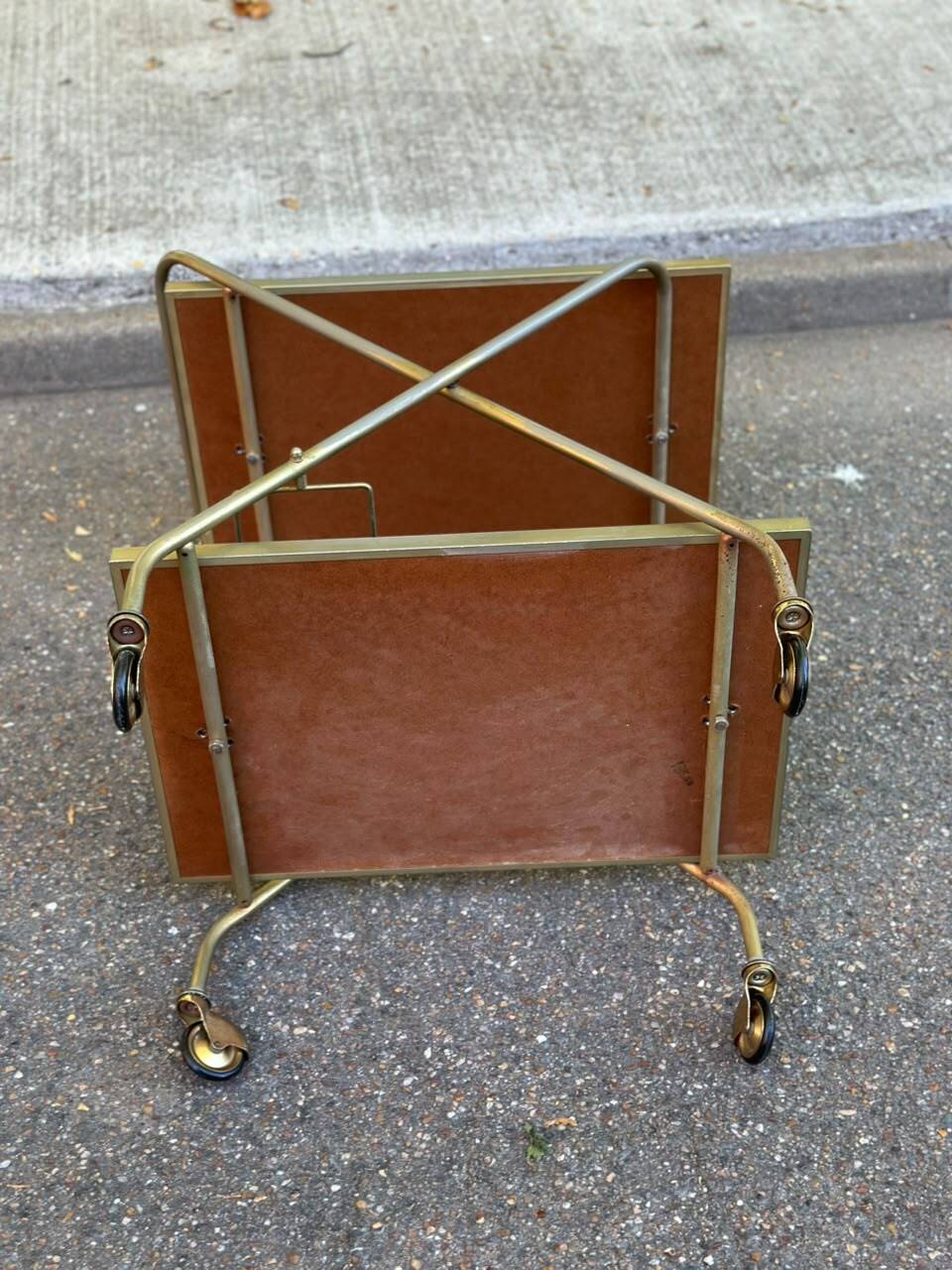 Mid-Century 1978 brass and black smoked glass wheeled dessert trolley.
