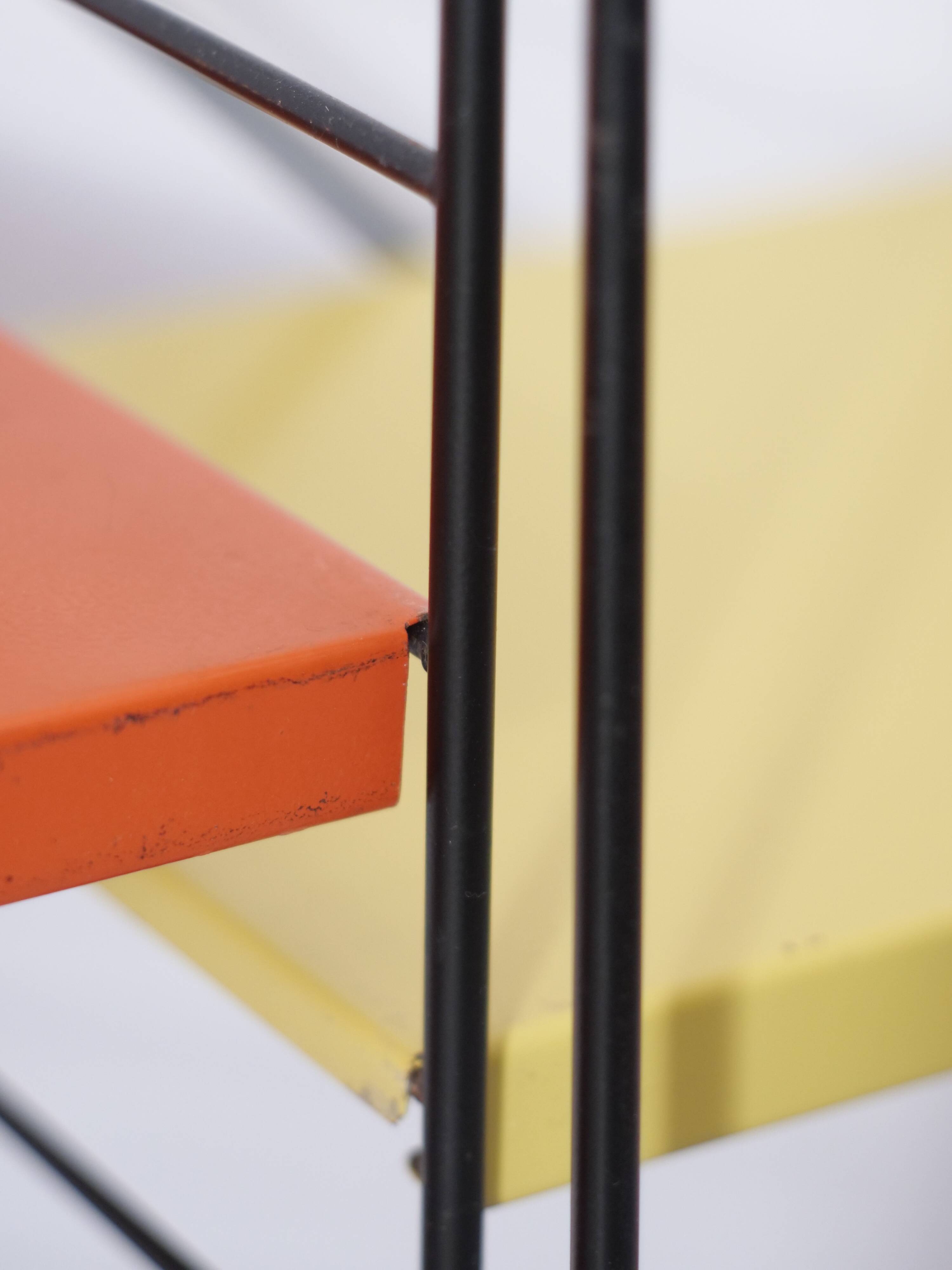 Tomado shelf in coloured metal floor shelves from 1958.