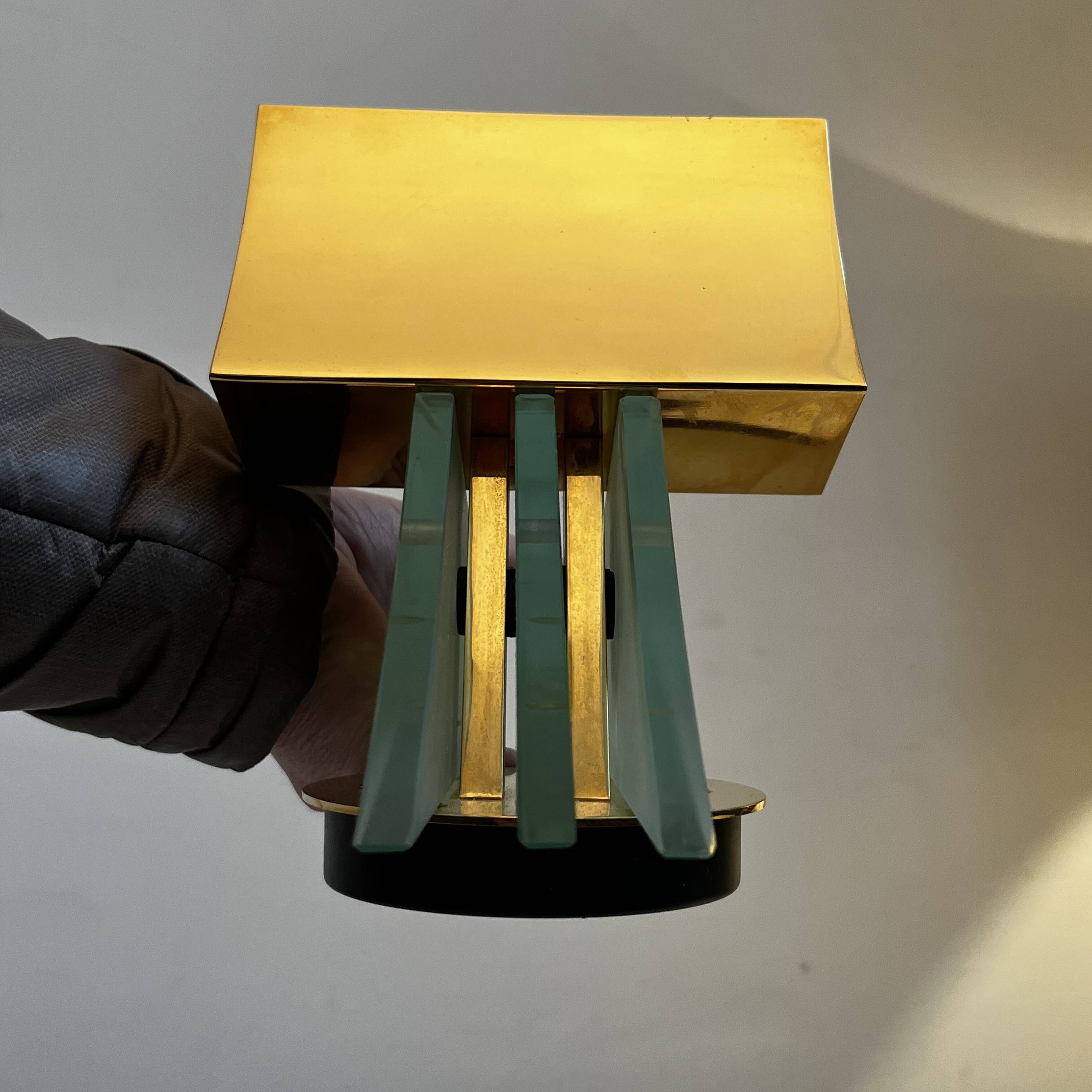 Pair of Hollywood Regency wall lights, bases & reflectors in gilded brass