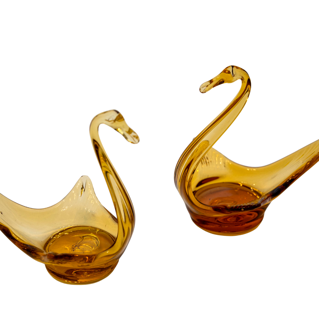 Pair of amber glass swans