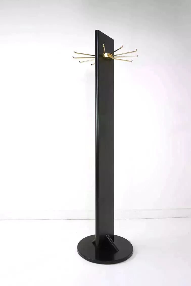 Swivel coat rack in black lacquered wood and brass