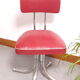 Chaise pivotante skaï bordeau 1960