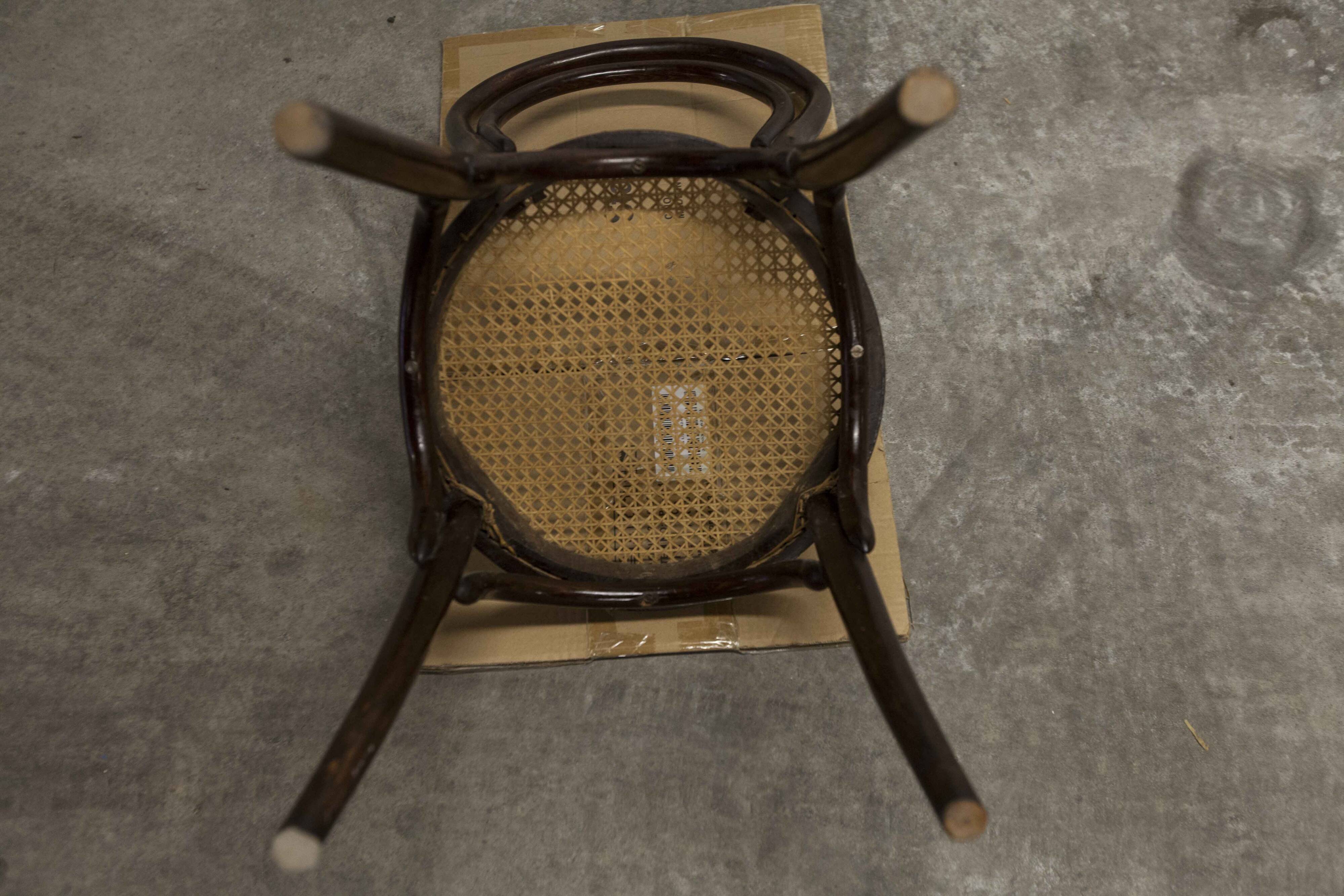 Ungvar Ungarn 1900 dark brown cane bistro chair