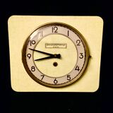 Wall clock with formica key