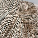 Eucalyptus wood bench and braided doum.