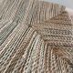 Eucalyptus wood bench and braided doum.