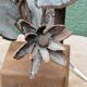 Brutalist metal lamp base, flowers