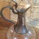 Glass and silver metal ewer