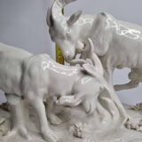 Saxon porcelain group, two fighting goats, signed Röhle, 1900