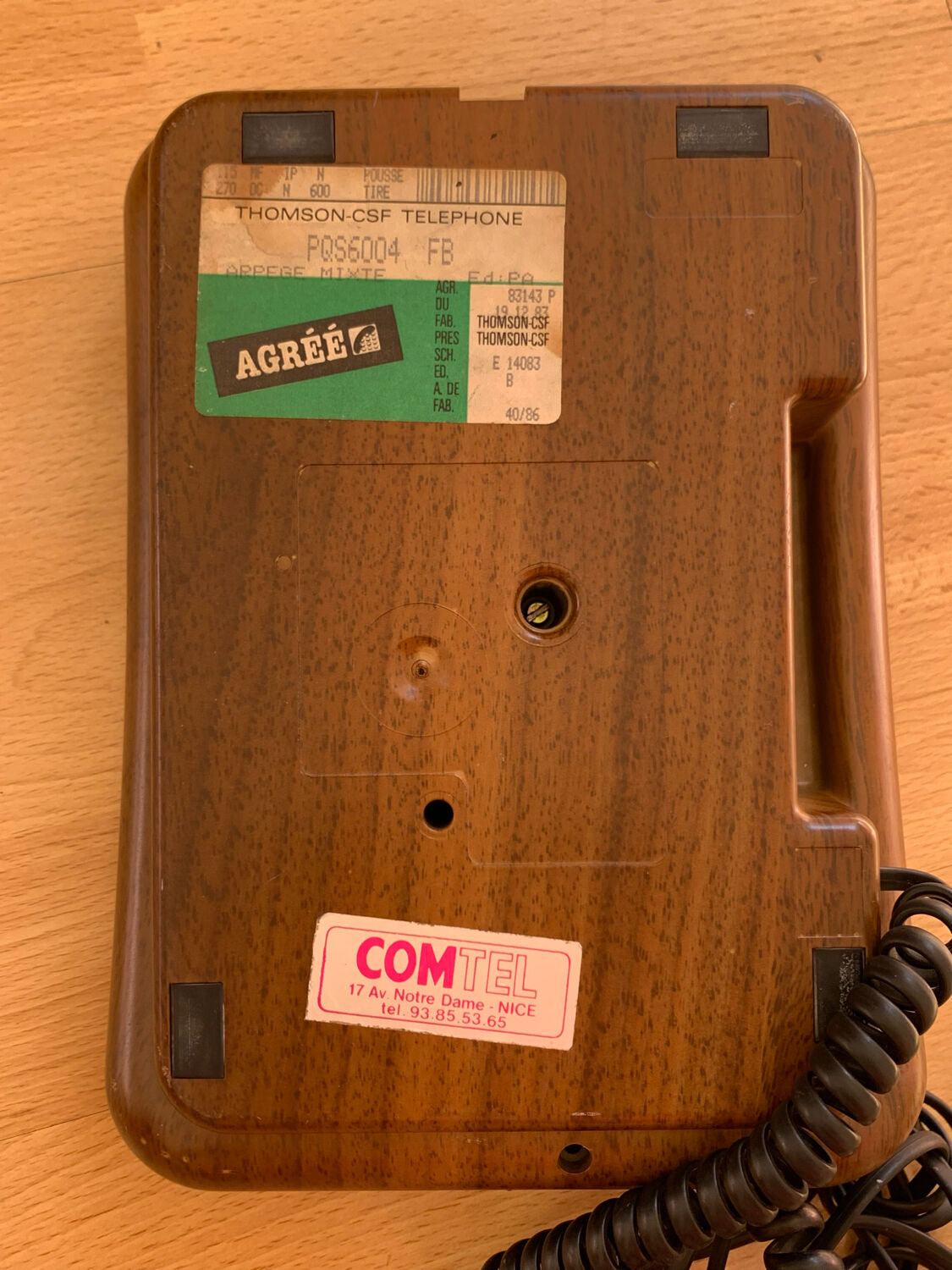 Old Thomson bakelite telephone and vintage wood