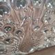 Peacock napkin holder in silver metal