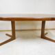 Expandable round teak table