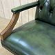 English chesterfield office armchair in green leather from the 1980s
