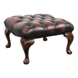 Dark brown chesterfield ottoman in cowhide leather