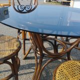 Rattan dining table and its 4 matching chairs