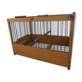Cage has wooden birds and ancient metal