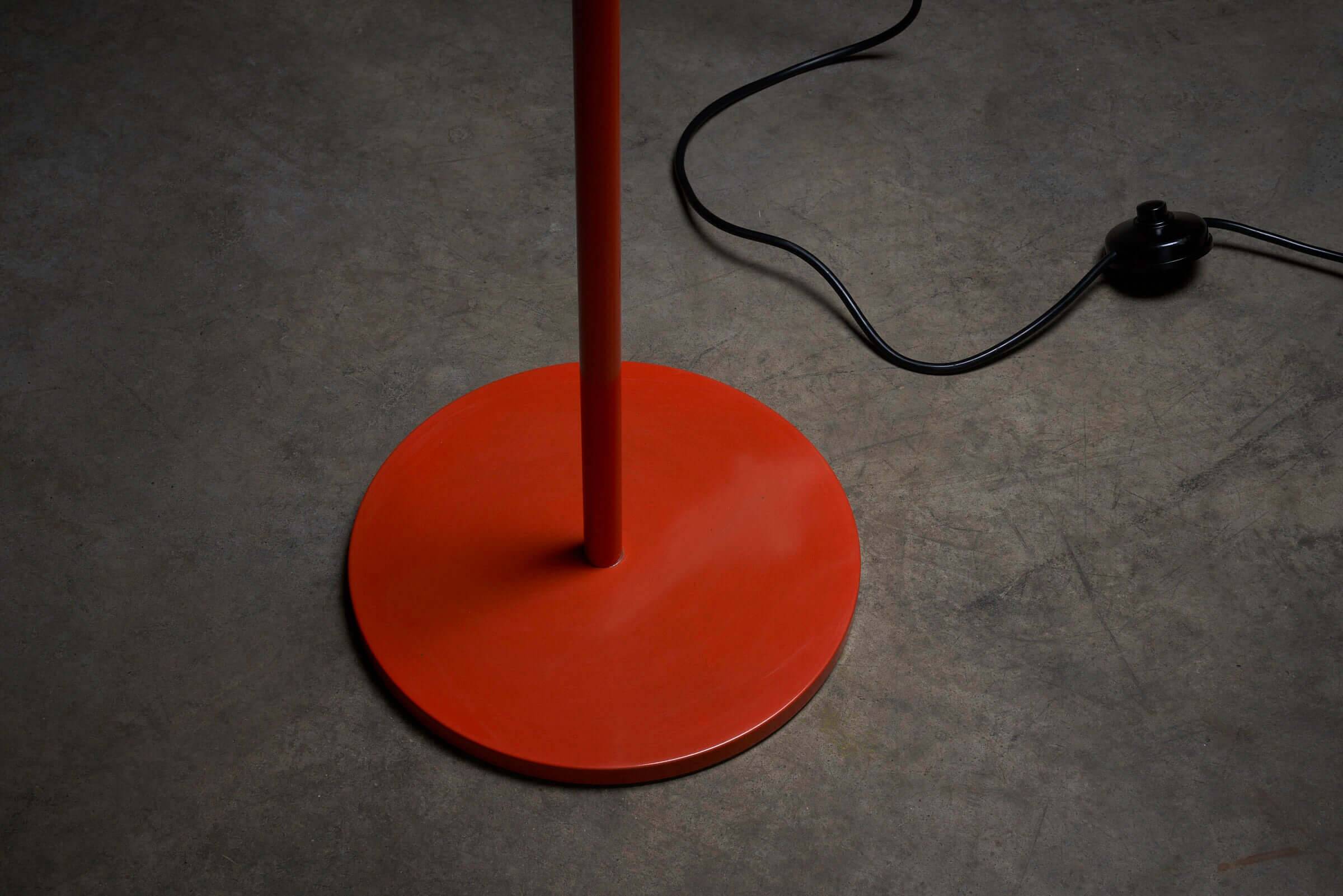 Bright orange spot floor lamp by Aneta