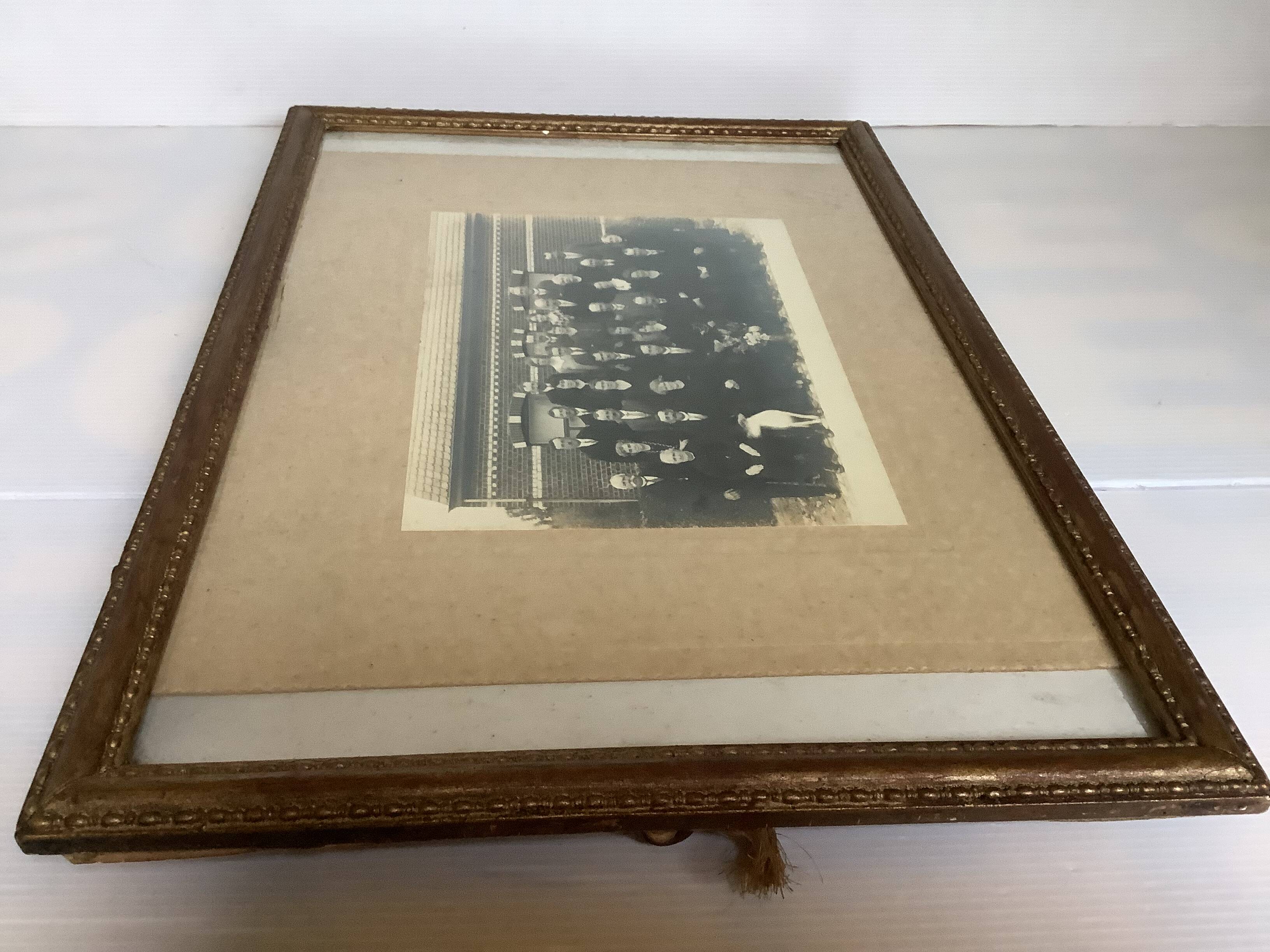 Old photograph of a newlywed couple with a dog