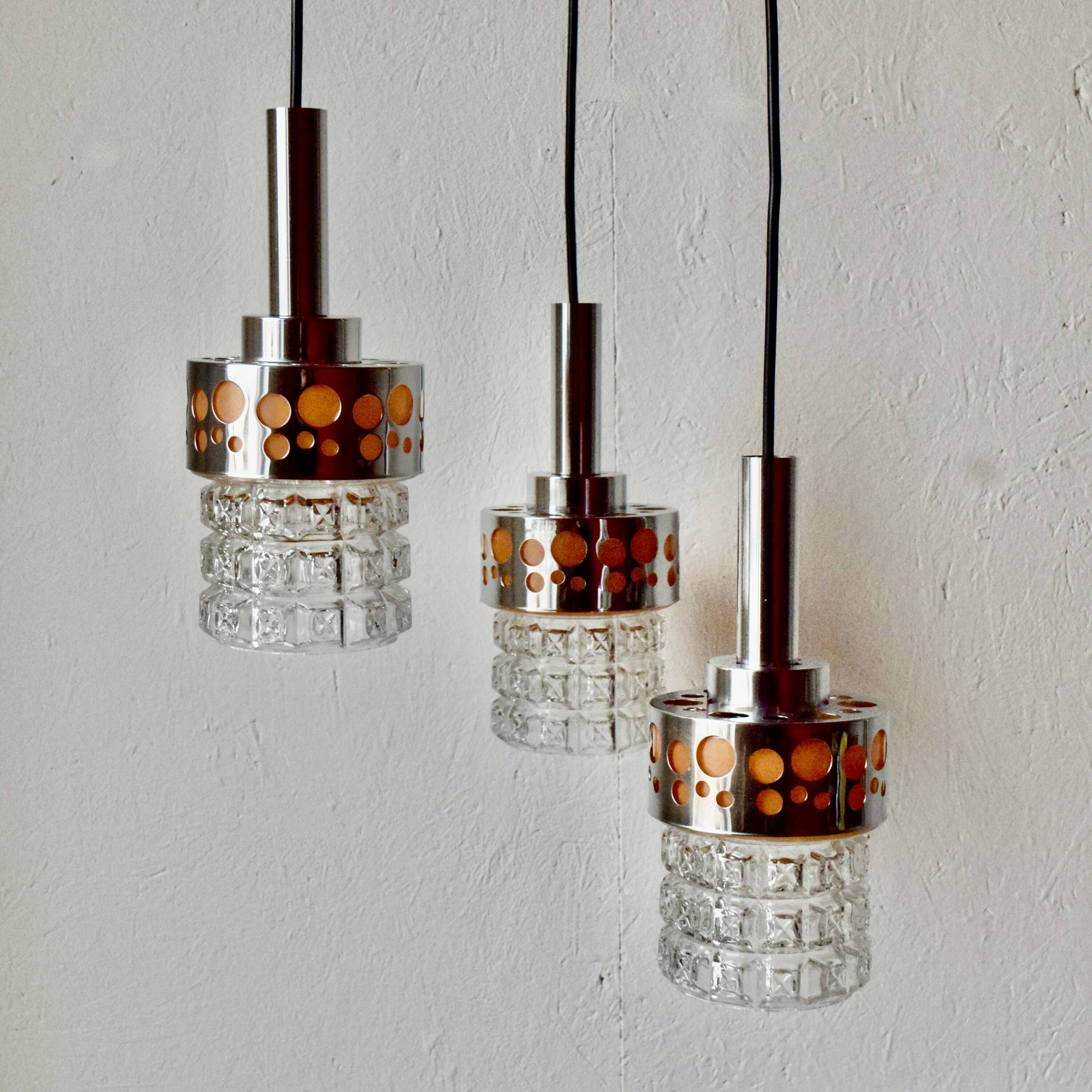 Triple vintage pendant light in molded glass, chrome metal and orange plastic - Space Age Design