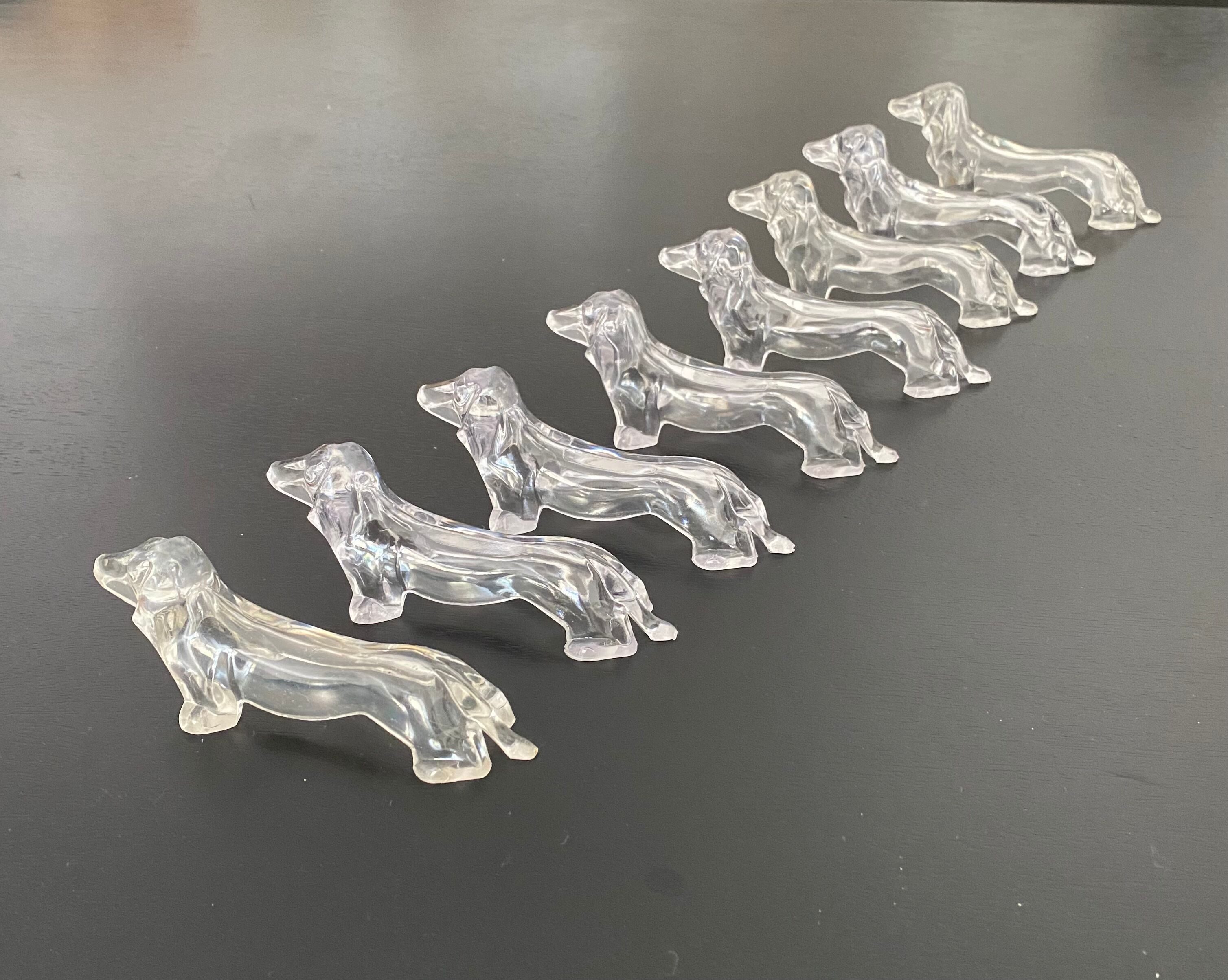 8 plastic knife holders, 70s, dachshund shape