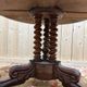 Round tripod gueridon from the Empire period with claw feet in mahogany and marble.