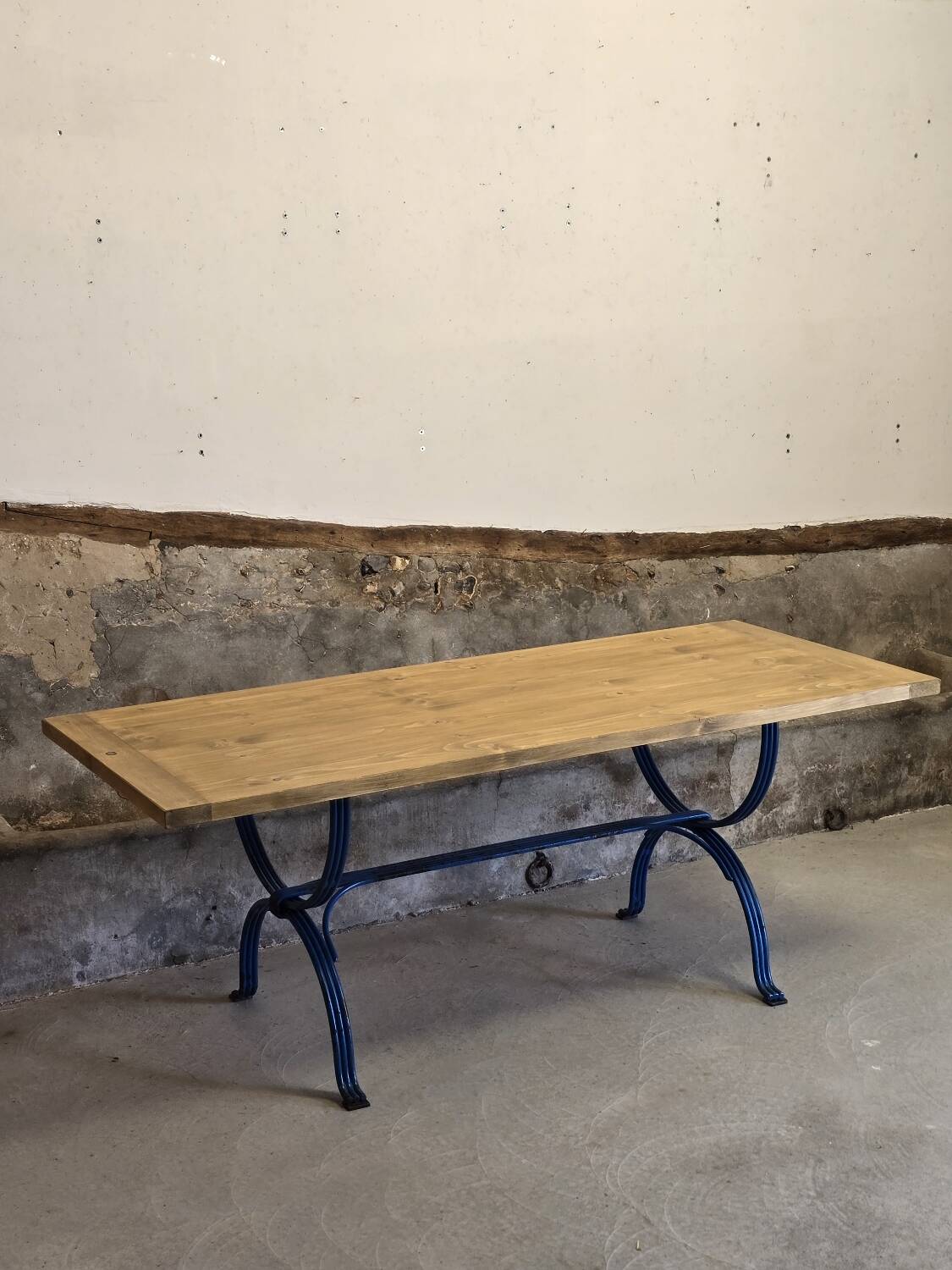 Wrought iron and solid wood table