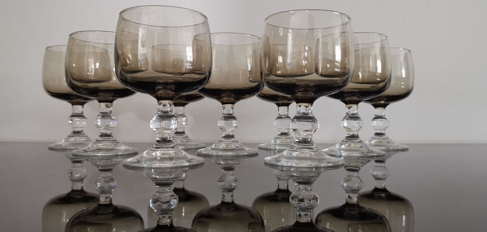 9 glasses of white wine on vintage stand Luminarc Smoked Black