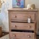 Small Parisian-style chest of drawers patinated in pink.