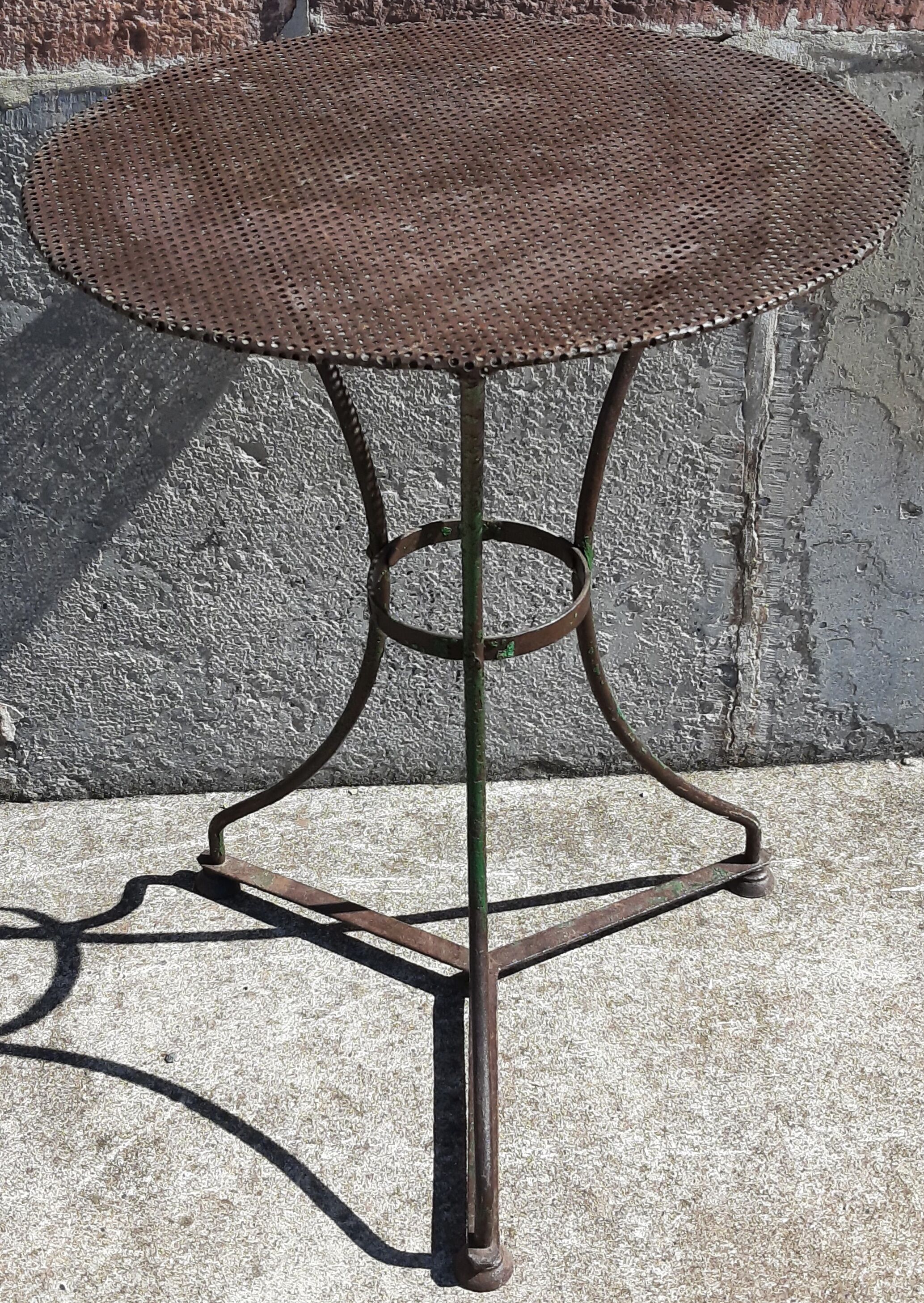 Wrought iron pedestal table