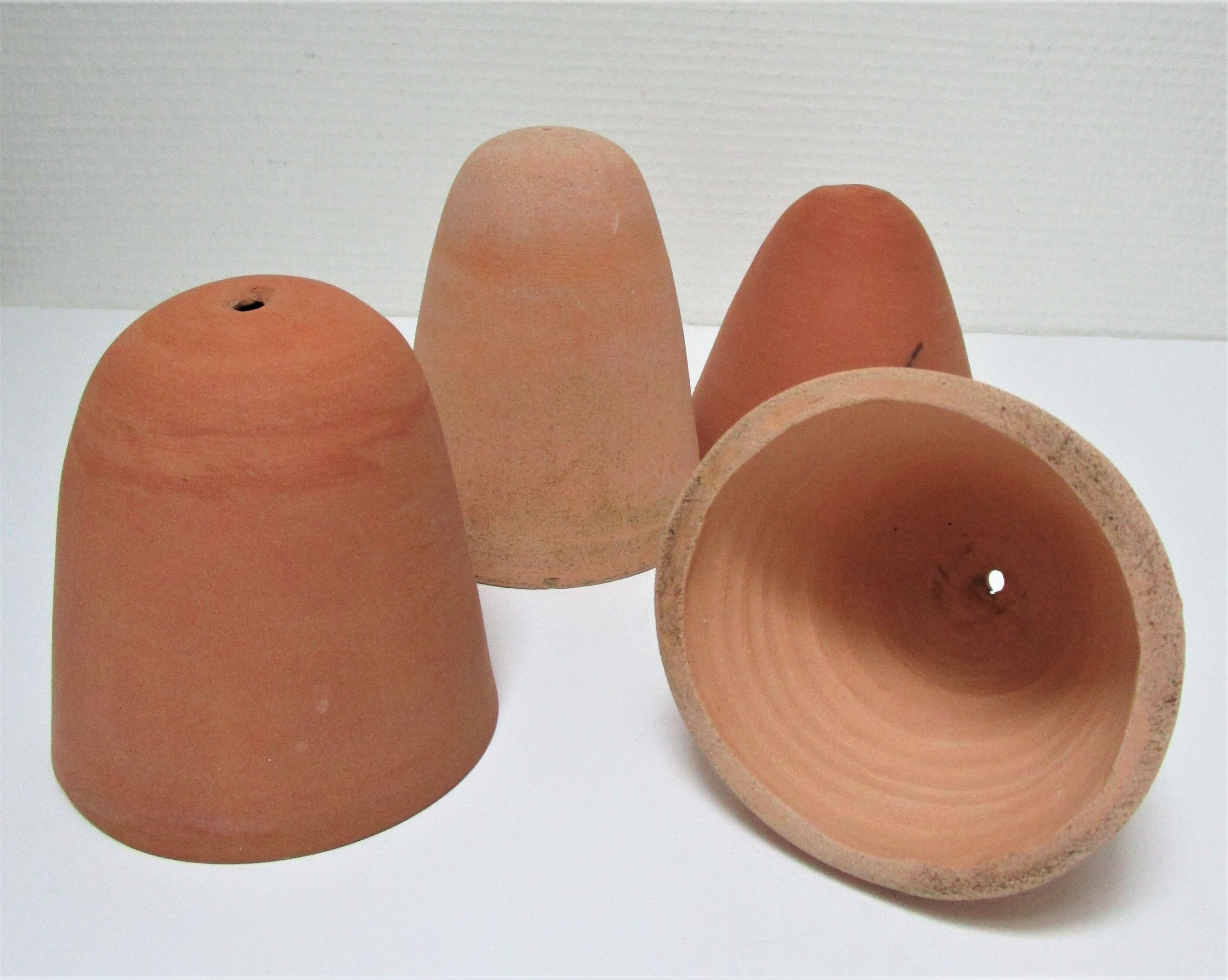 Four bells for seedlings in vintage terracotta