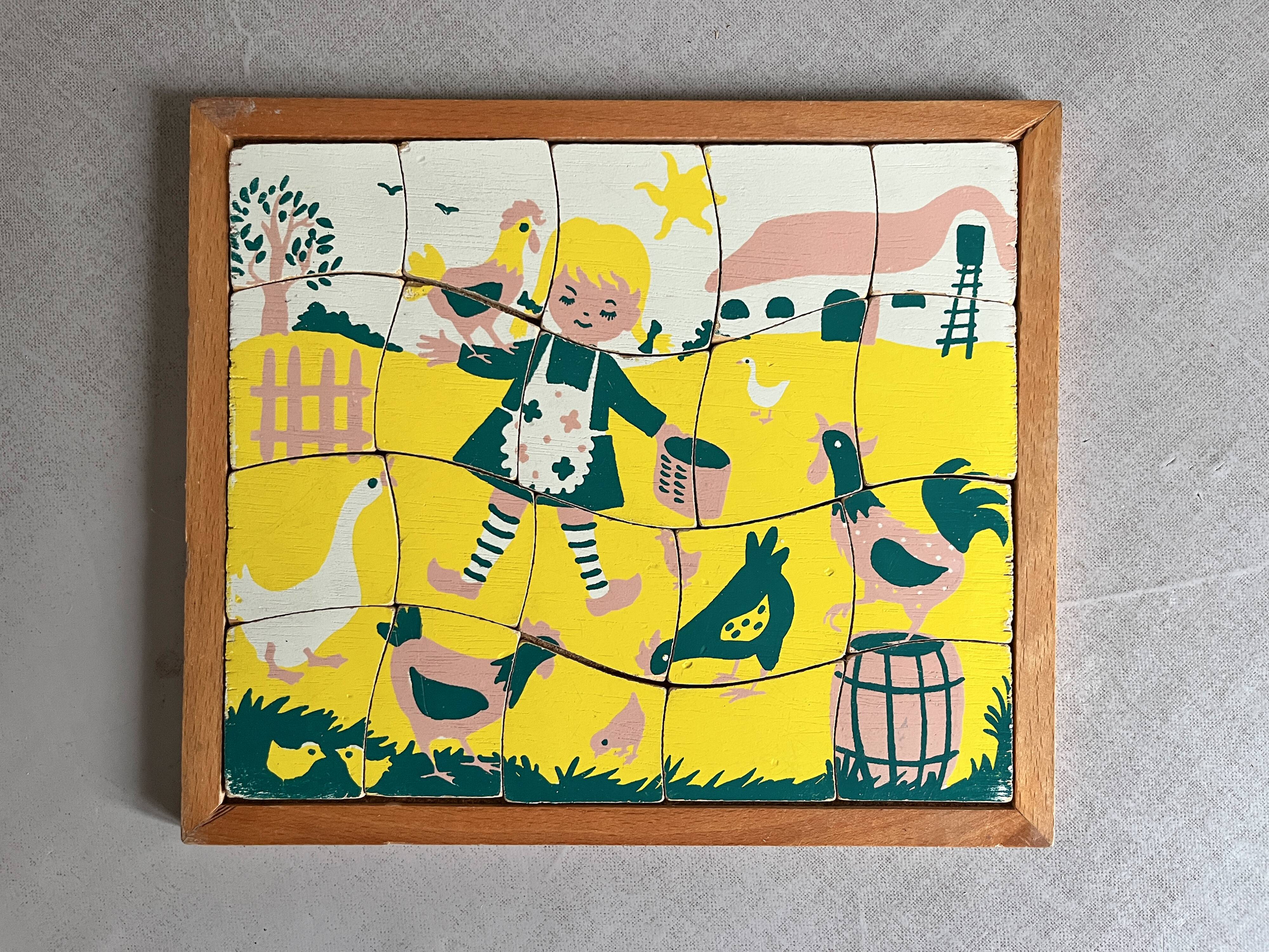 Wooden frame puzzle from the 1940s/50s depicting a farmer's wife.