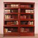 pair of Globe Wernicke London 'waterfall' bookcases in mahogany circa