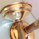 Pair of empire style brass candlesticks