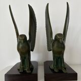 Pair of eagle bookends in green patina regula with rosewood base