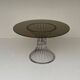 Space Age round dining table in chrome metal and smoked glass.