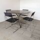 1970s Italian dining table in smoked glass and chrome.