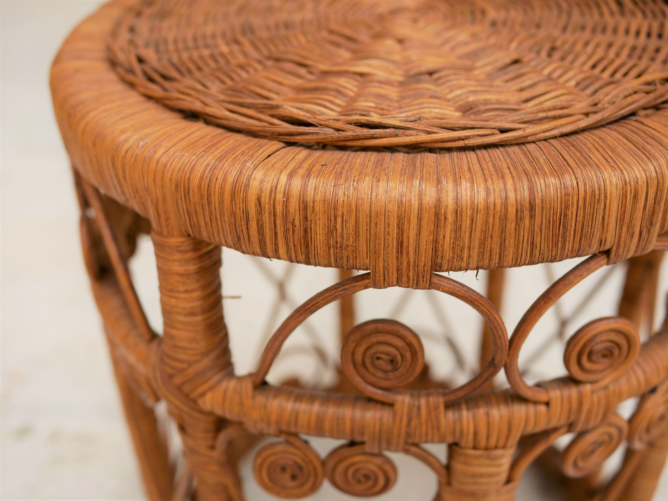 Vintage peacock stool in rattan