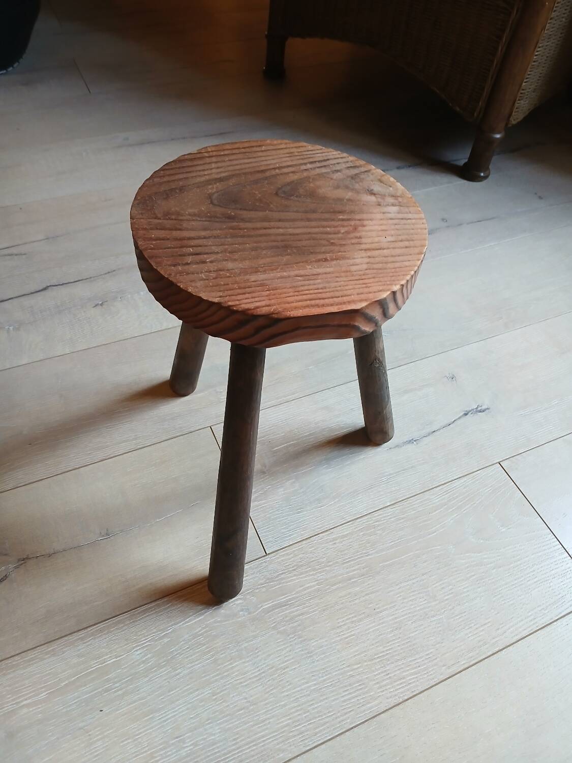 Wooden tripod stool