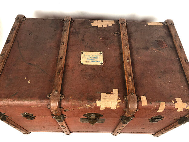 Old travel trunk cardboard, fabric and leather