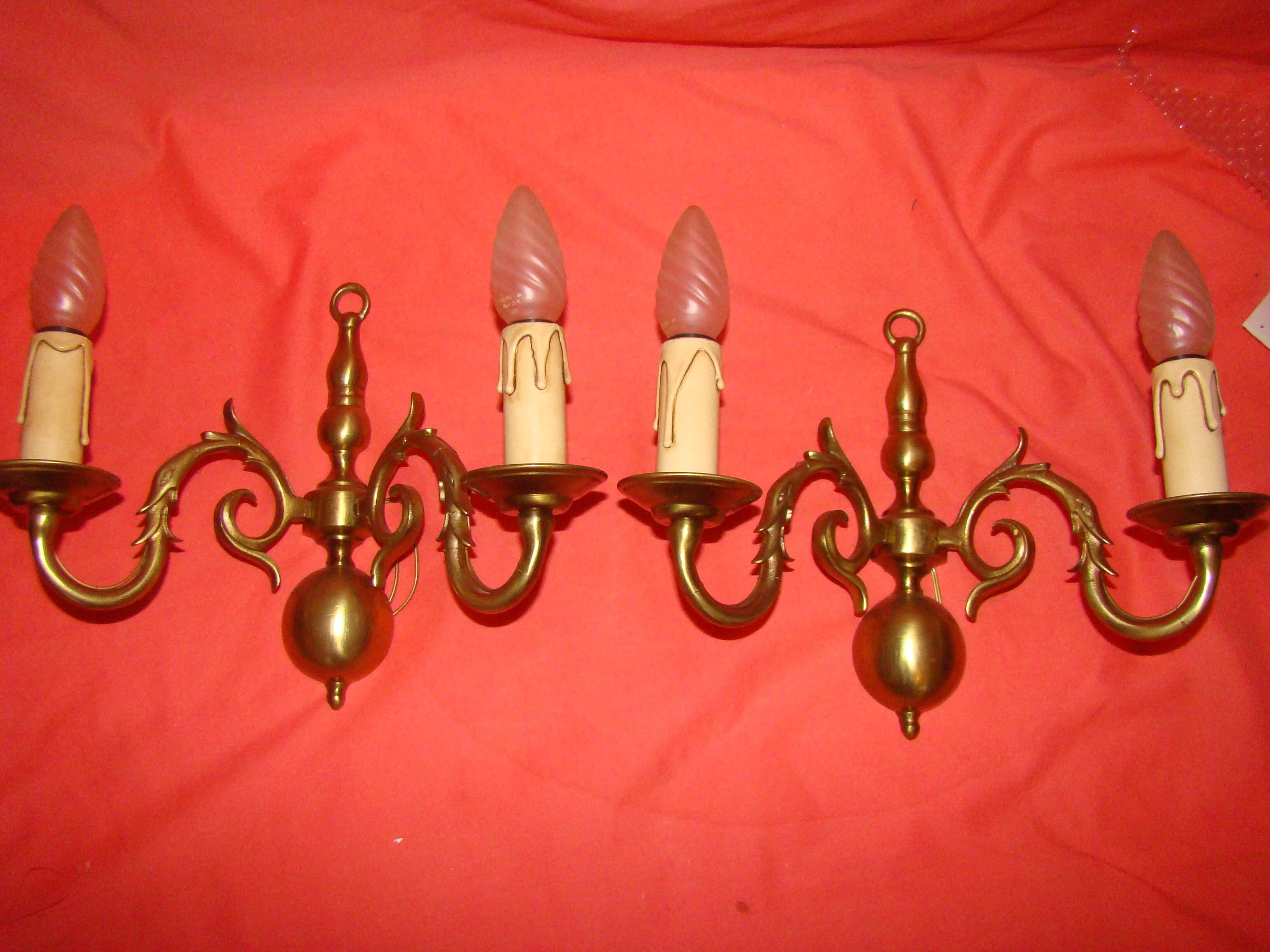 Pair of bronze wall lights with 2 arms in "Dutch" style.