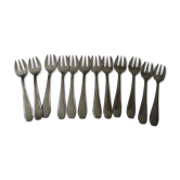 Set of 12 silver metal oyster forks.