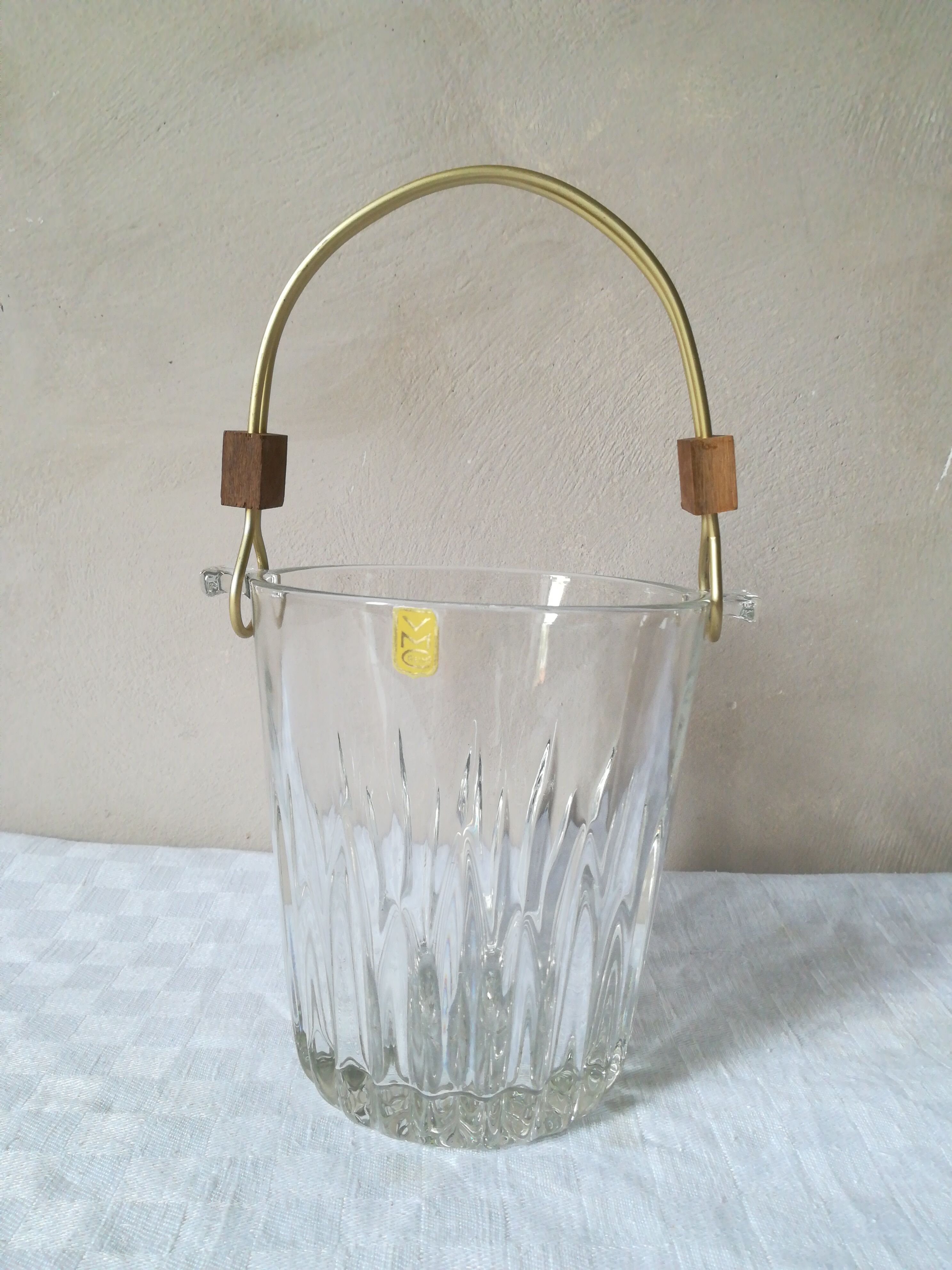 Ice bucket with gold and teak handle