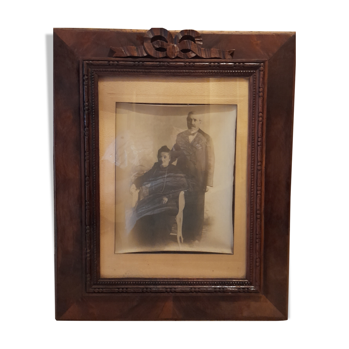 Wooden frame glass with knot and old photo