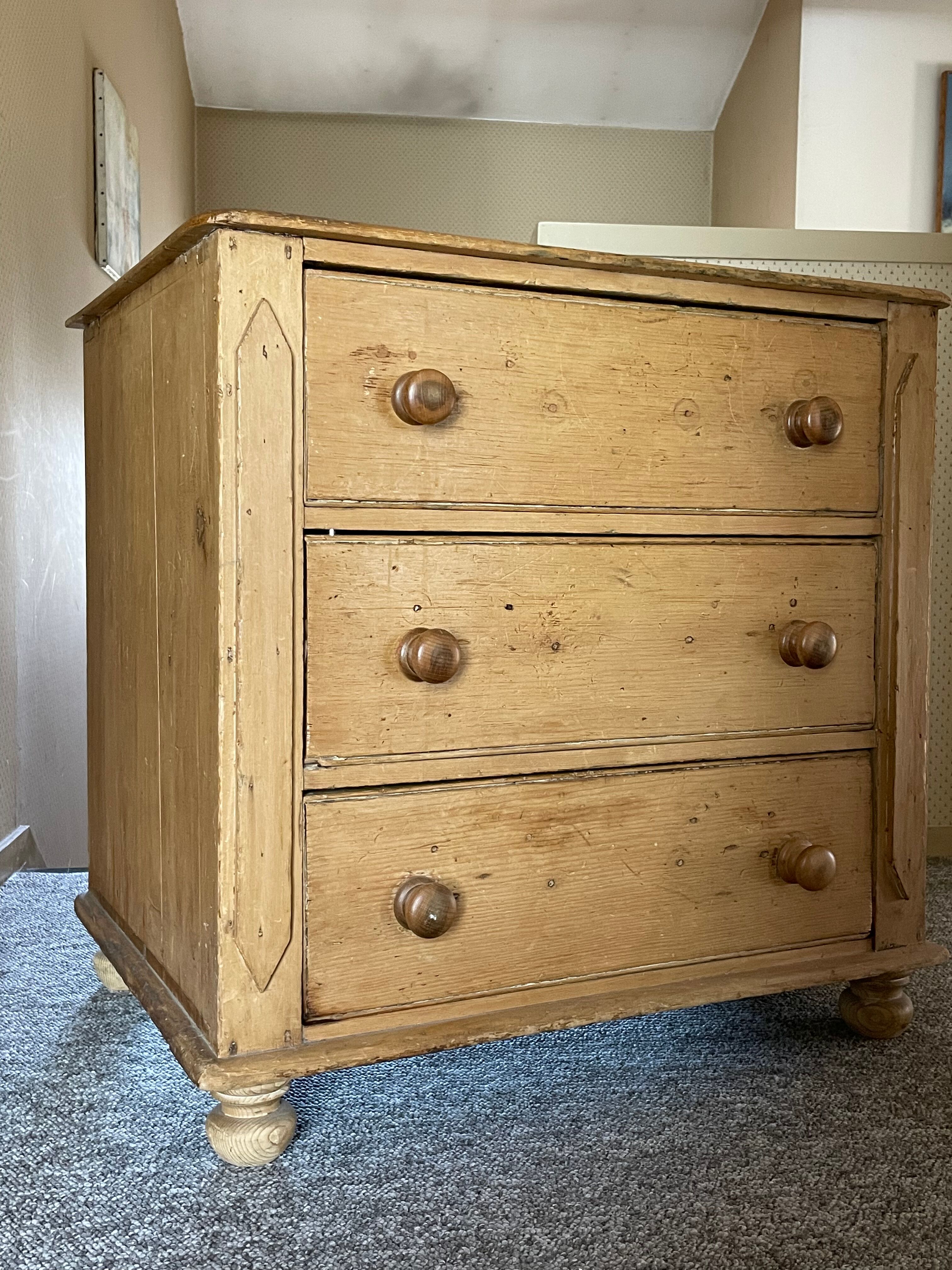 Old English chest of drawers made of pine wood