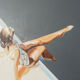 Seated woman painting