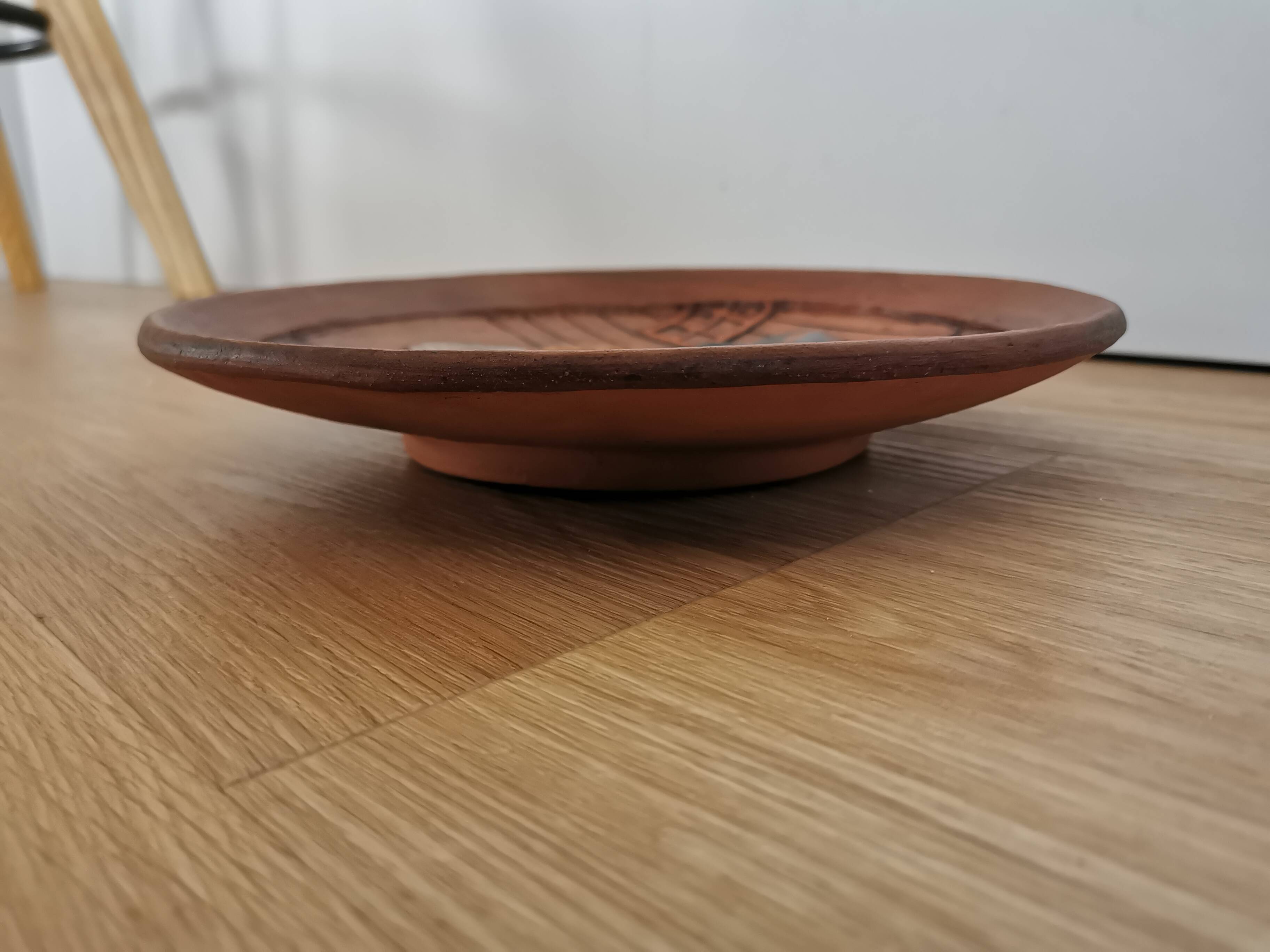 Vintage Embossed Clay Plate: Man Drinking, Retro Wall Decor