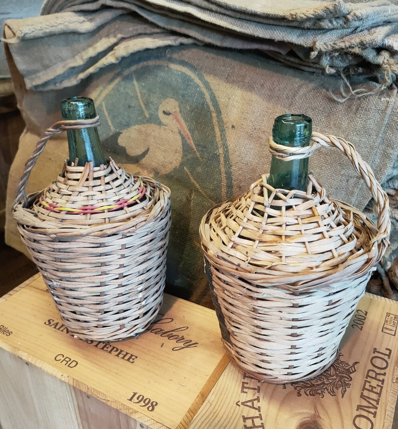 Pair of vintage demijohns