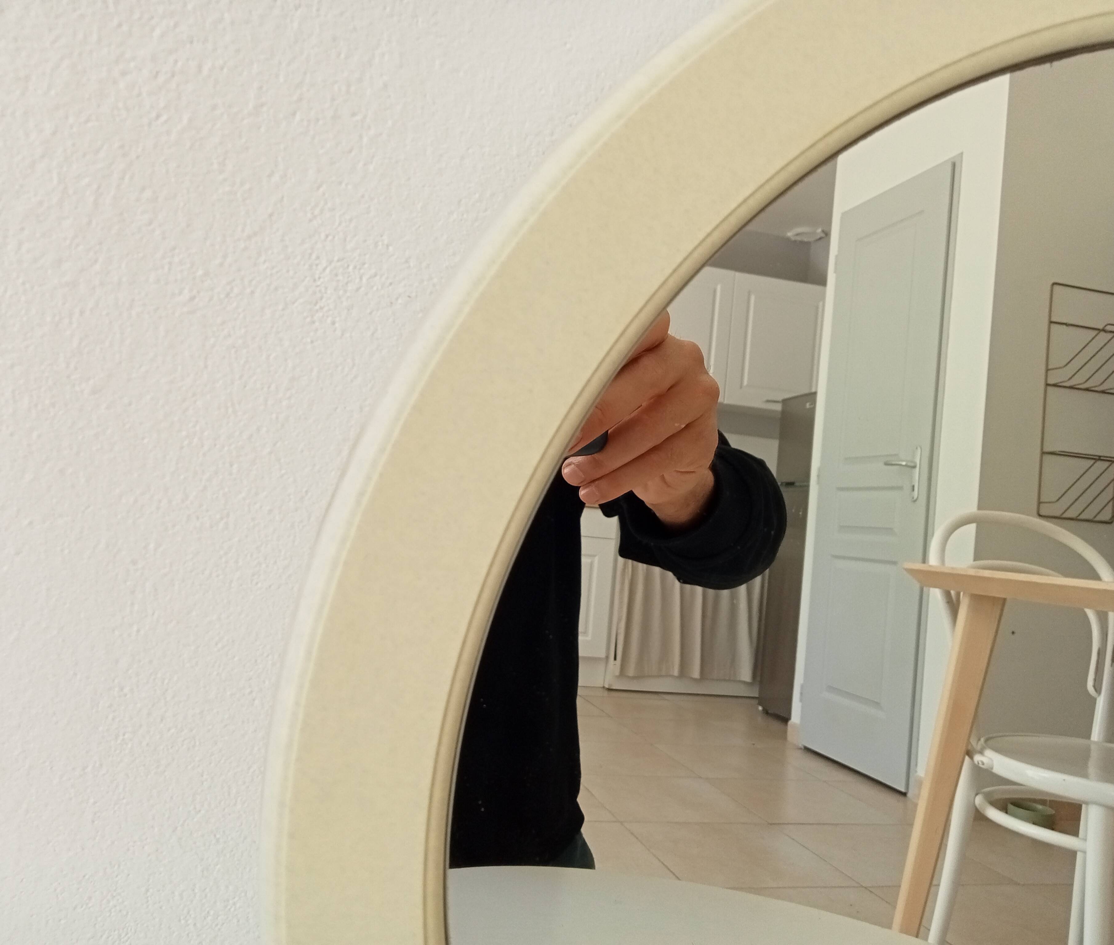 Vintage round mirror from the 70s/80s.
