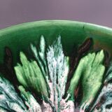 Green faience bowl decorated with multicolored drips around 1970